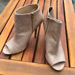 Peep toe 3 inch heel dress shoes.